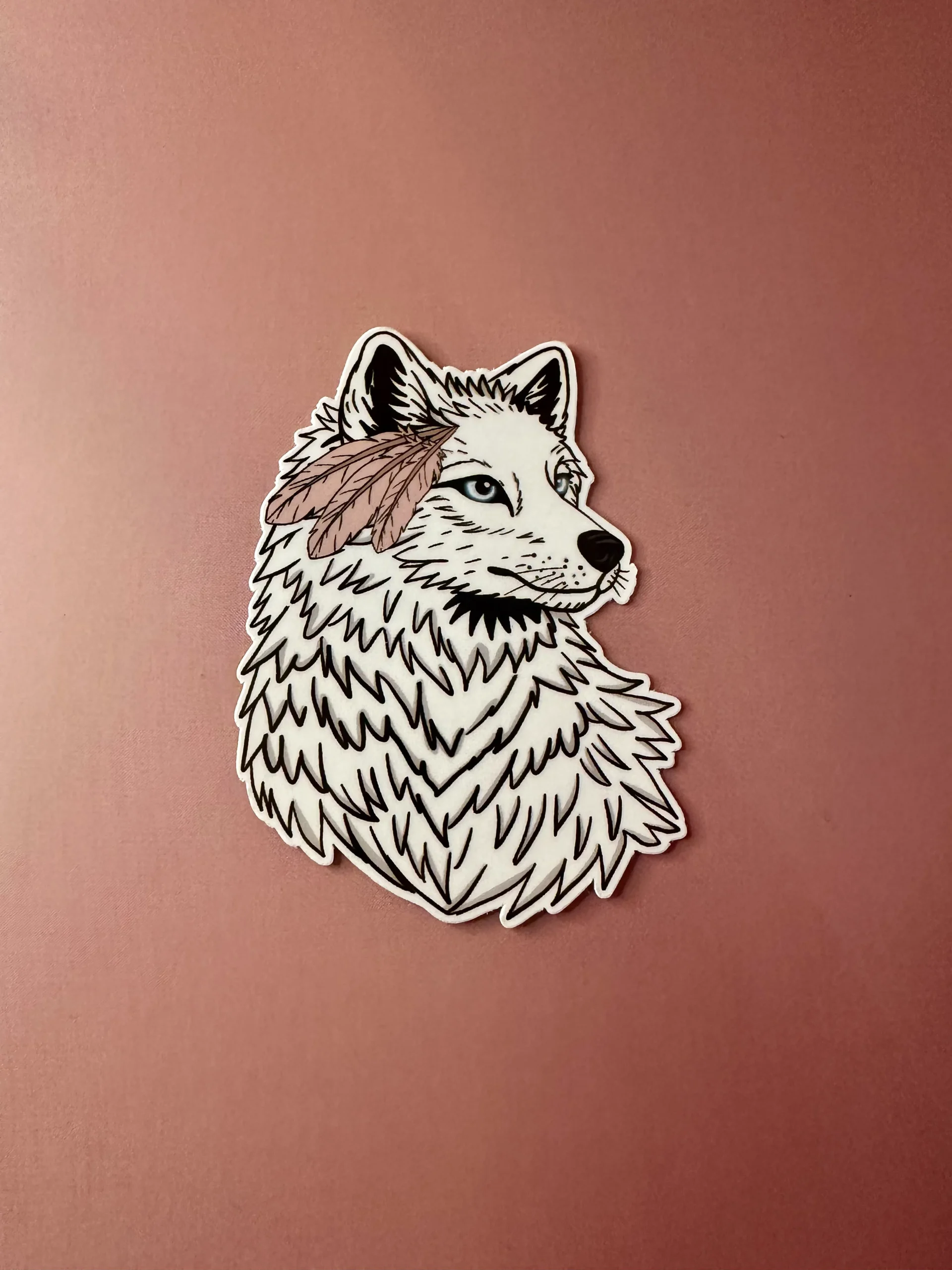 Sticker tête de loup avec plume bohème